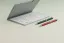 Editorial folder and pens conveying a fast, disciplined RFC process.