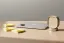 Calm remote workstation with timer and notes showing durable team rituals.